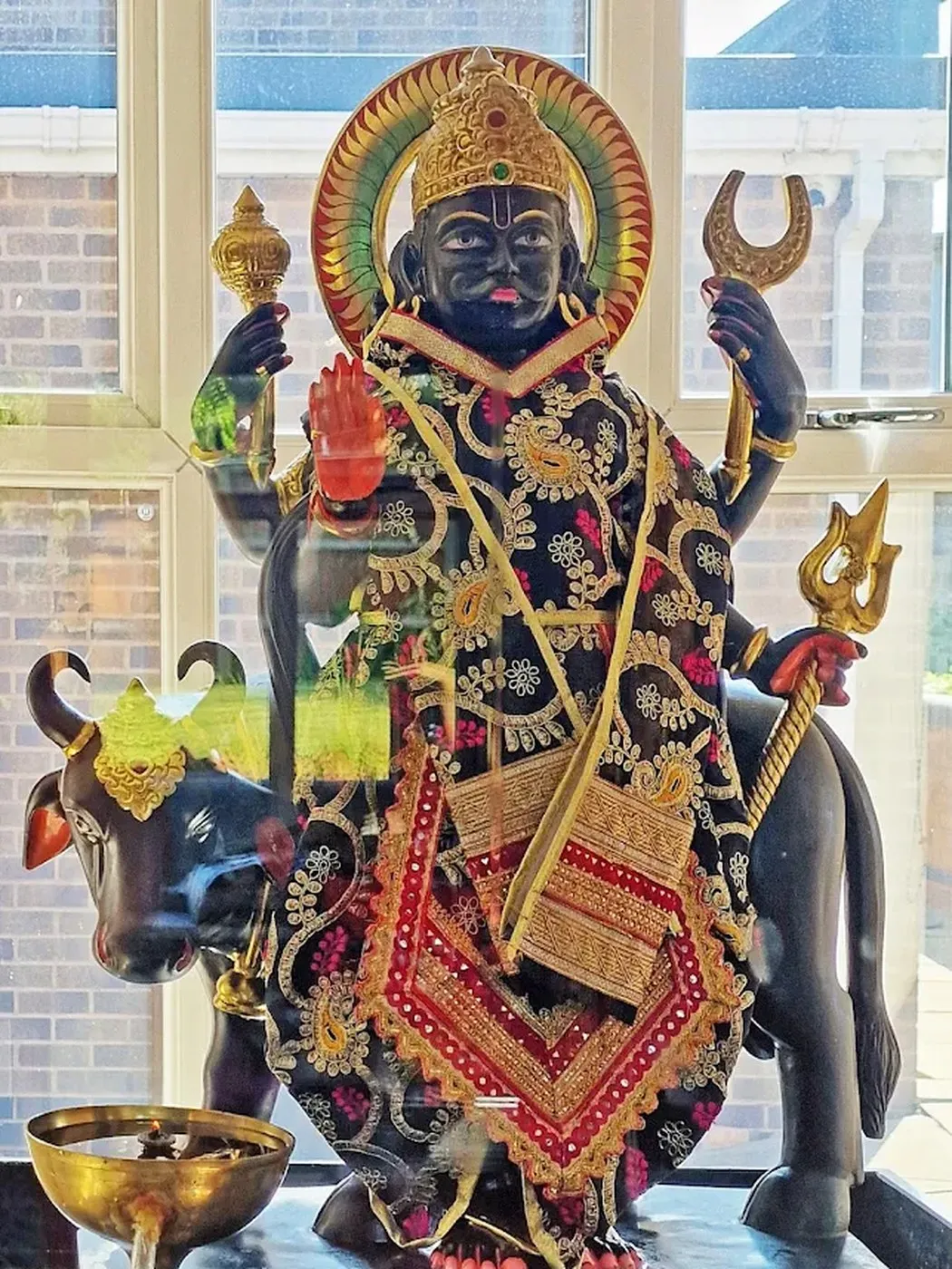 Shani Dev at Shri Maha Kali Bhameshwari Mandir, dressed in the shringar of a different day (1 of 2)